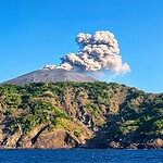 Rugged volcanic coastline of Barren Island surrounded by tropical sea in the Andaman region