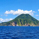 Pristine tropical landscape of the Nicobar Islands surrounded by lush greenery and the sea