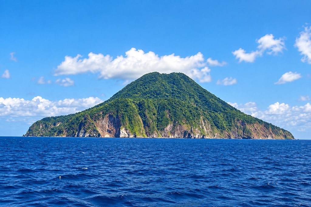 Pristine tropical landscape of the Nicobar Islands surrounded by lush greenery and the sea