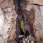 Tourists exploring the limestone cave in Baratang Island, Andaman.
