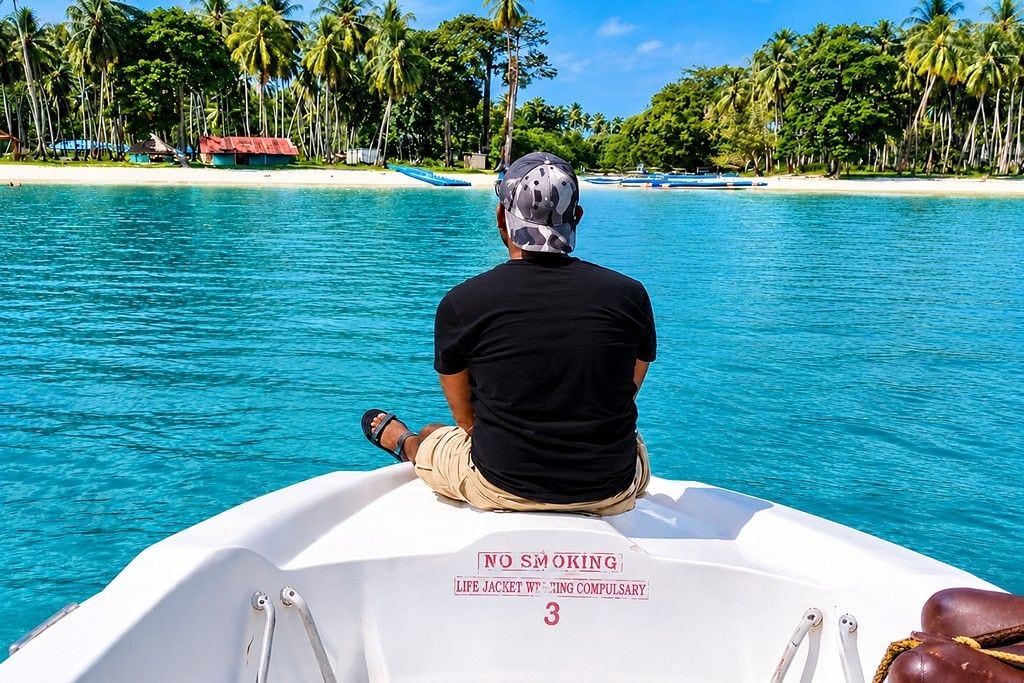 Guest arriving at Lalaji Bay Beach by speed boat in Long Island Andaman