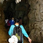 Tourists exploring the limestone cave in Baratang Island, Andaman.