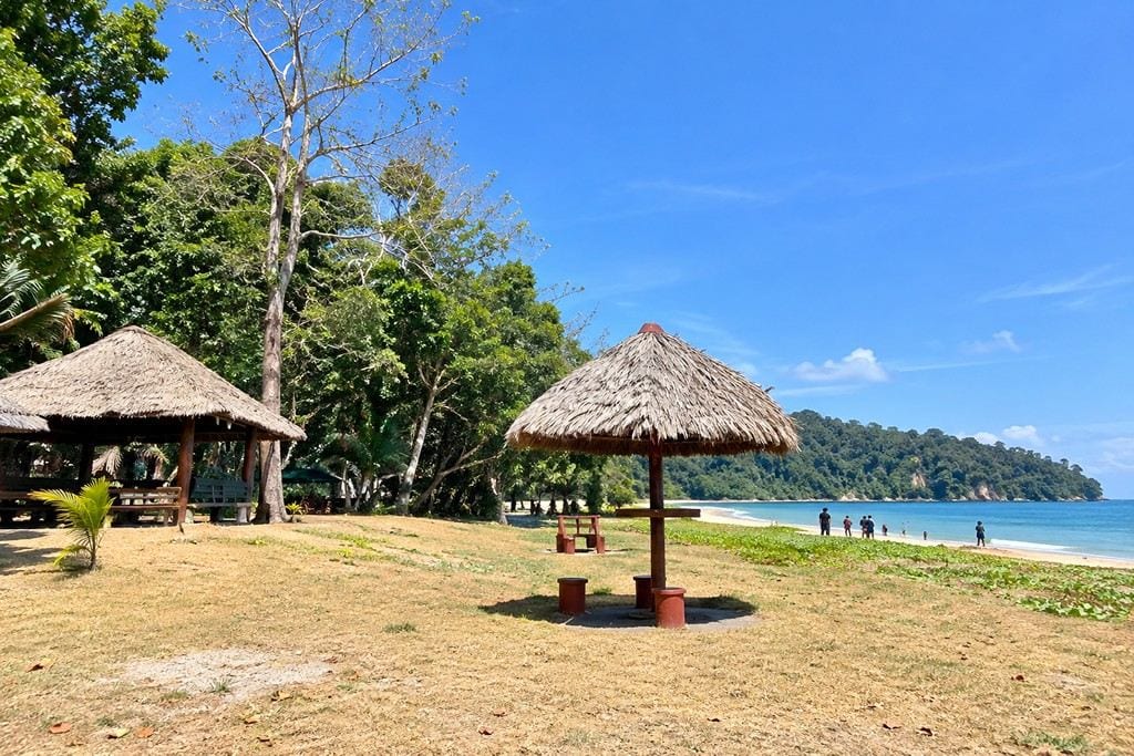 Quiet coastal setting of Ramnagar Beach near Diglipur surrounded by tropical greenery