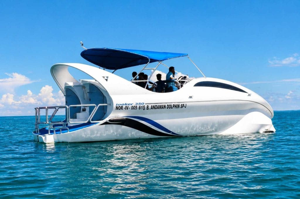 Andaman Dolphin Glass Bottom Boat Ride for viewing coral reefs, colorful fish, and marine life through underwater glass panels.