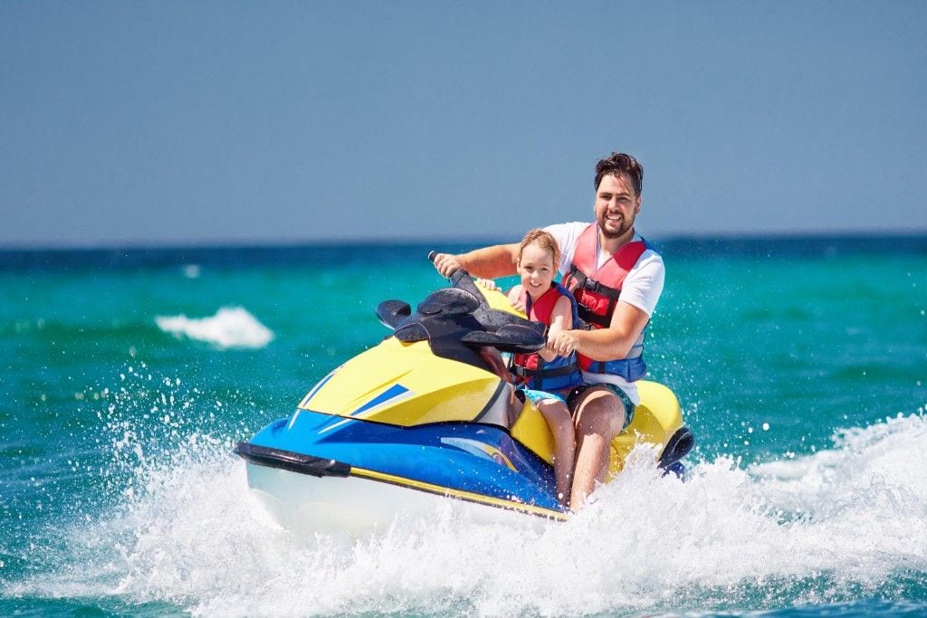 Jet Ski in Andaman with an exciting ride across clear blue sea waters near the tropical islands.