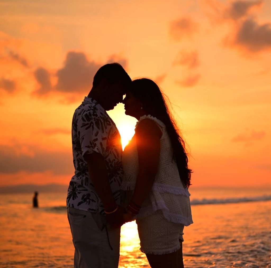 Photoshoot in Andaman with couples enjoying a romantic beach photography session surrounded by tropical scenery.