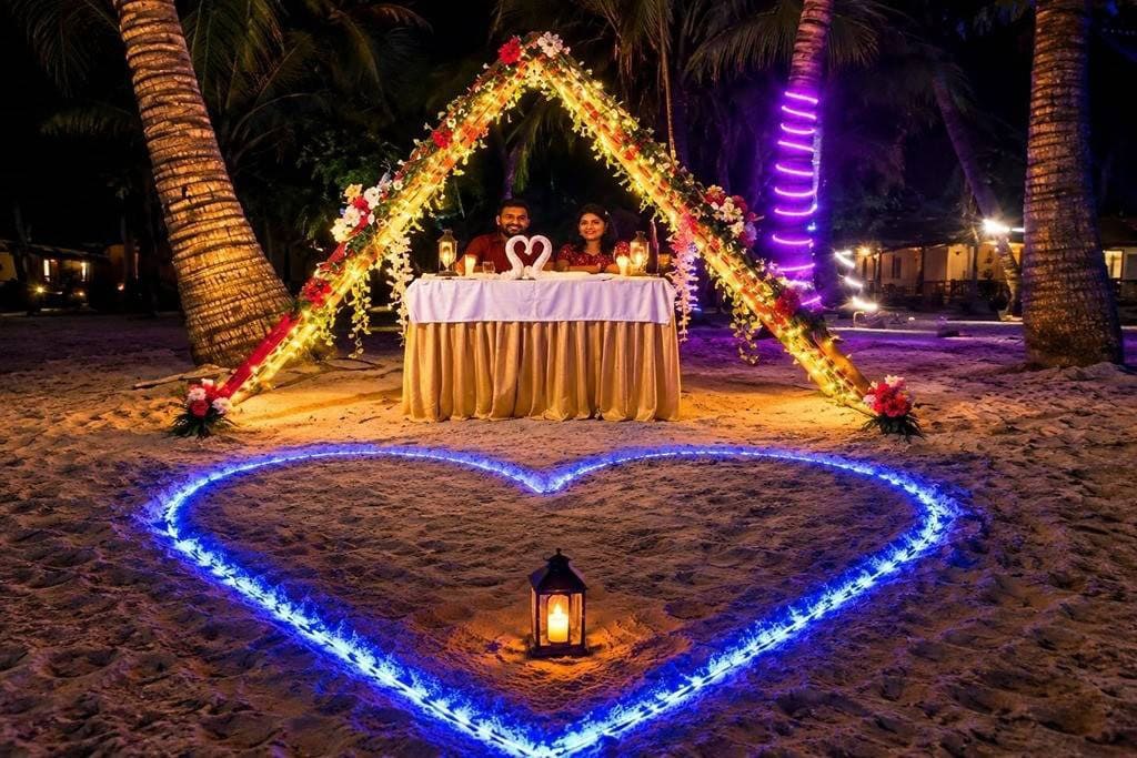Couple enjoying romantic beach dinner in Andaman Islands