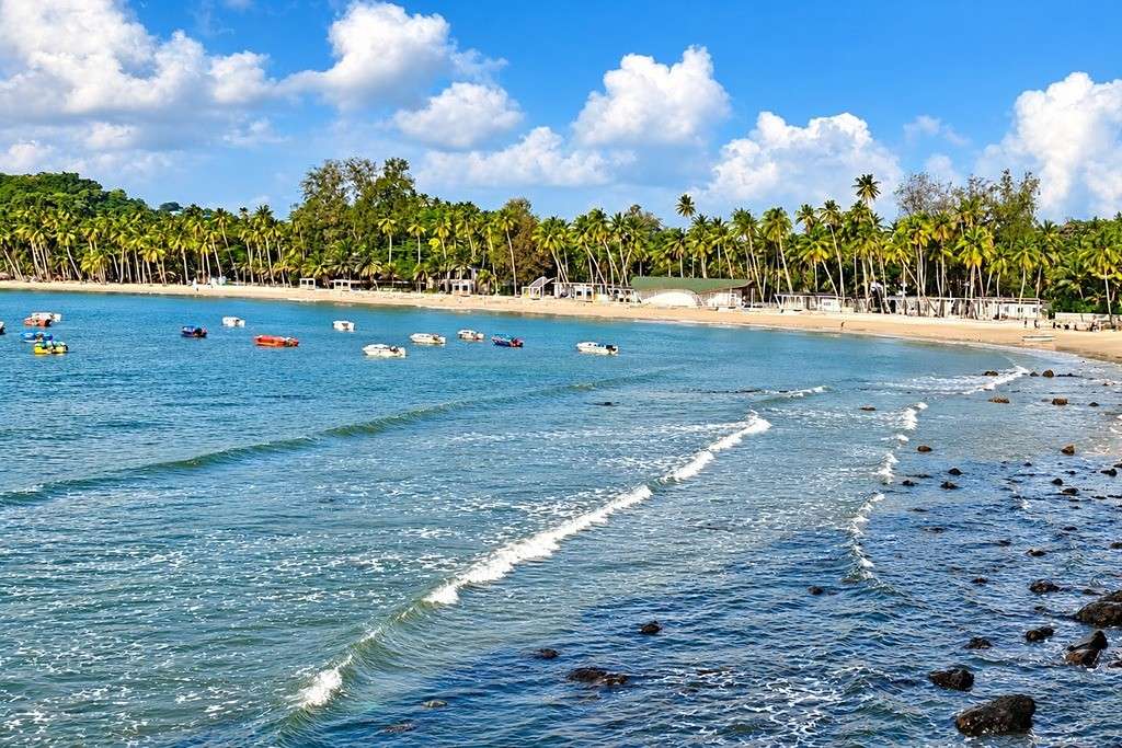 Scenic Corbyn's Cove Beach in Port Blair with tropical surroundings, a popular stop on an Andaman honeymoon trip