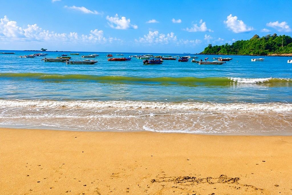 Scenic view of Corbyn’s Cove Beach in Port Blair, Andaman Islands with sandy shore and tropical sea