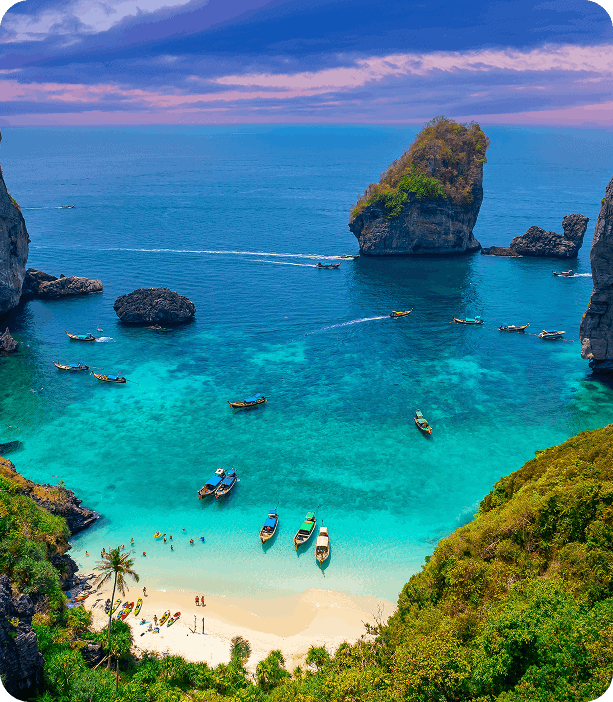 Beautiful beach in Andaman with turquoise waters and boats.