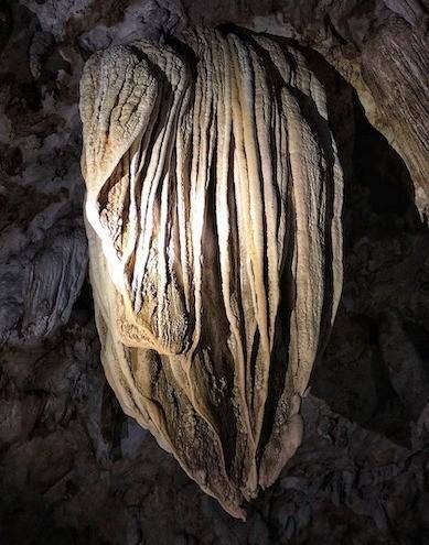 Limestone Cave at Baratang Island, Andaman & Nicobar Islands, featuring natural limestone formations surrounded by mangrove forests.
