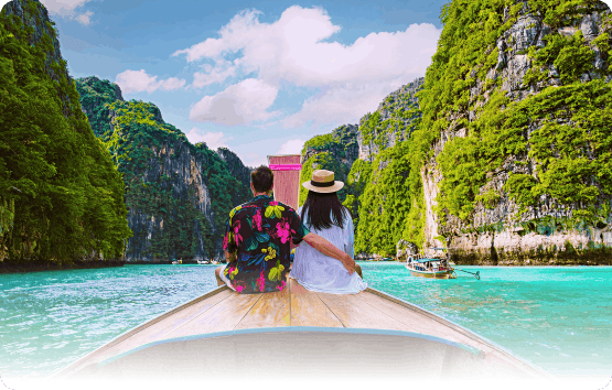 Couple enjoying a boat ride through lush green islands in Andaman.