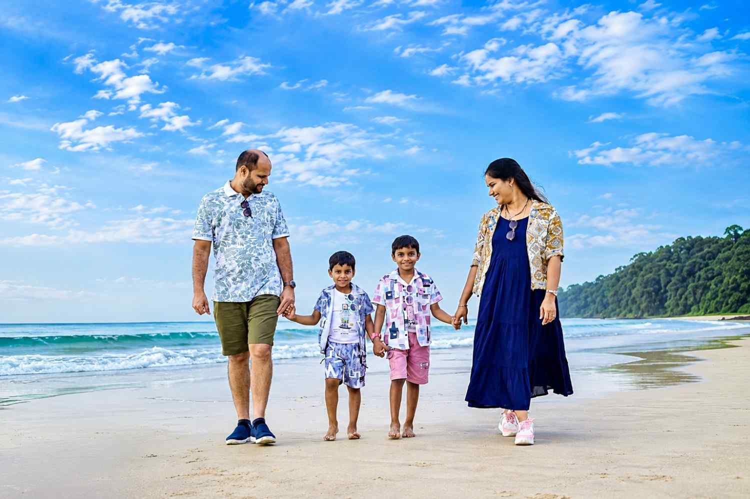 Happy family creating unforgettable travel memories with Andaman Ocean Tours & Travels during their vacation in the Andaman Islands.
