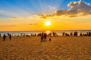Sunset over Andaman Beach with people enjoying the view.