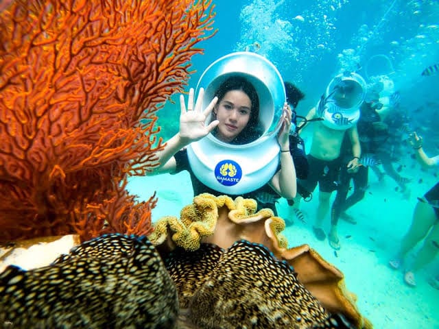 Guests enjoying Sea Walking in the Andaman Islands during their Andaman tour package from Bangalore.
