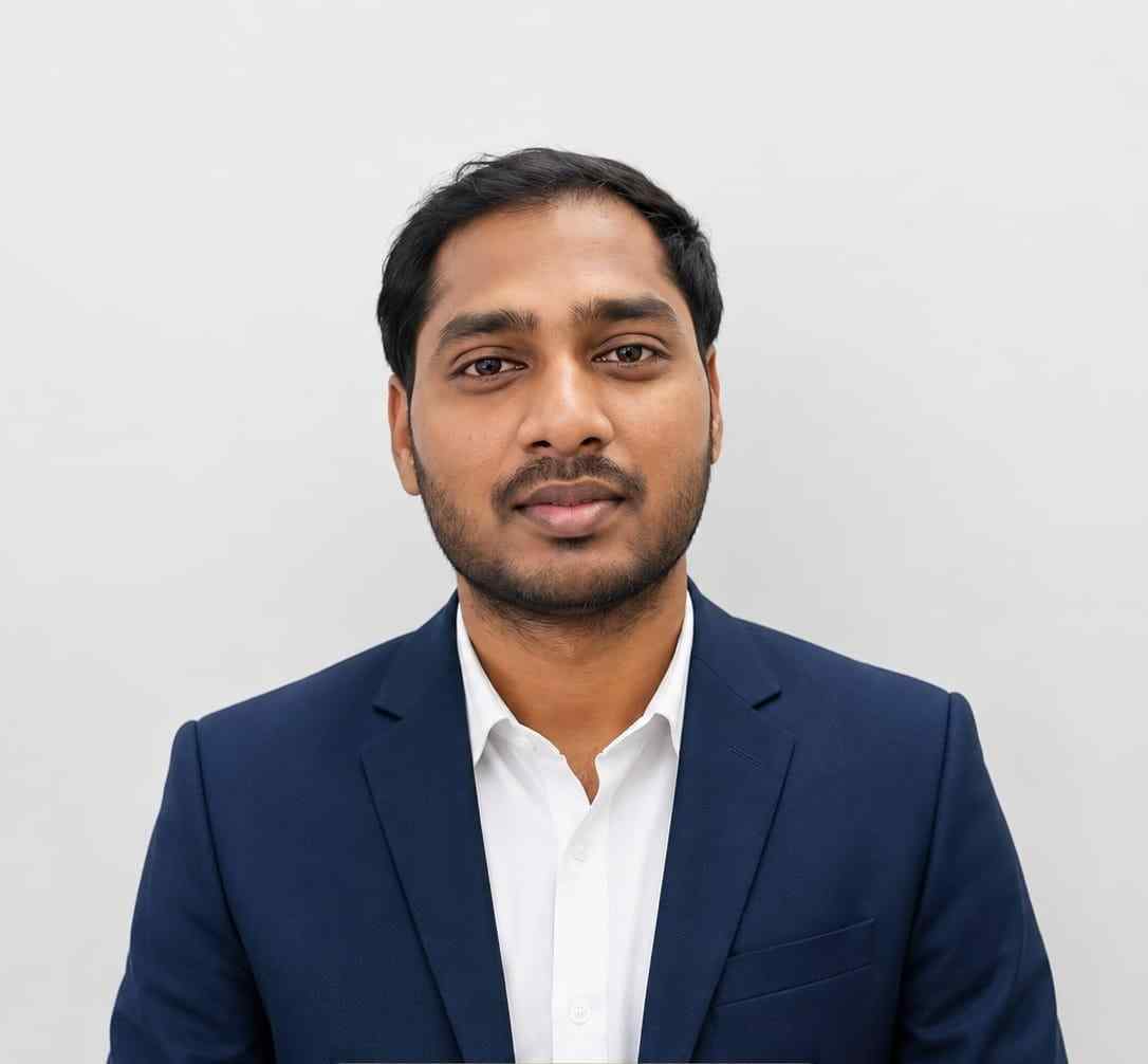 Business professional in formal suit for corporate profile.