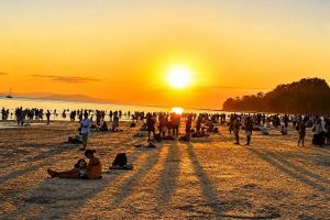 Crowd enjoying sunset on the beach during evening in Andaman.