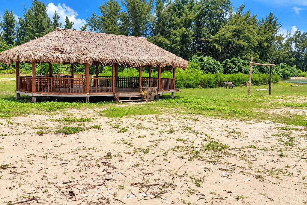 Tropical shoreline at Baludera Beach in Baratang with natural coastal surroundings